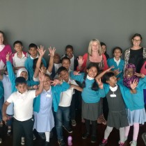 The children from Ben Jonson Primary School with teachers and volunteers