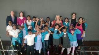 The children from Ben Jonson Primary School with teachers and volunteers